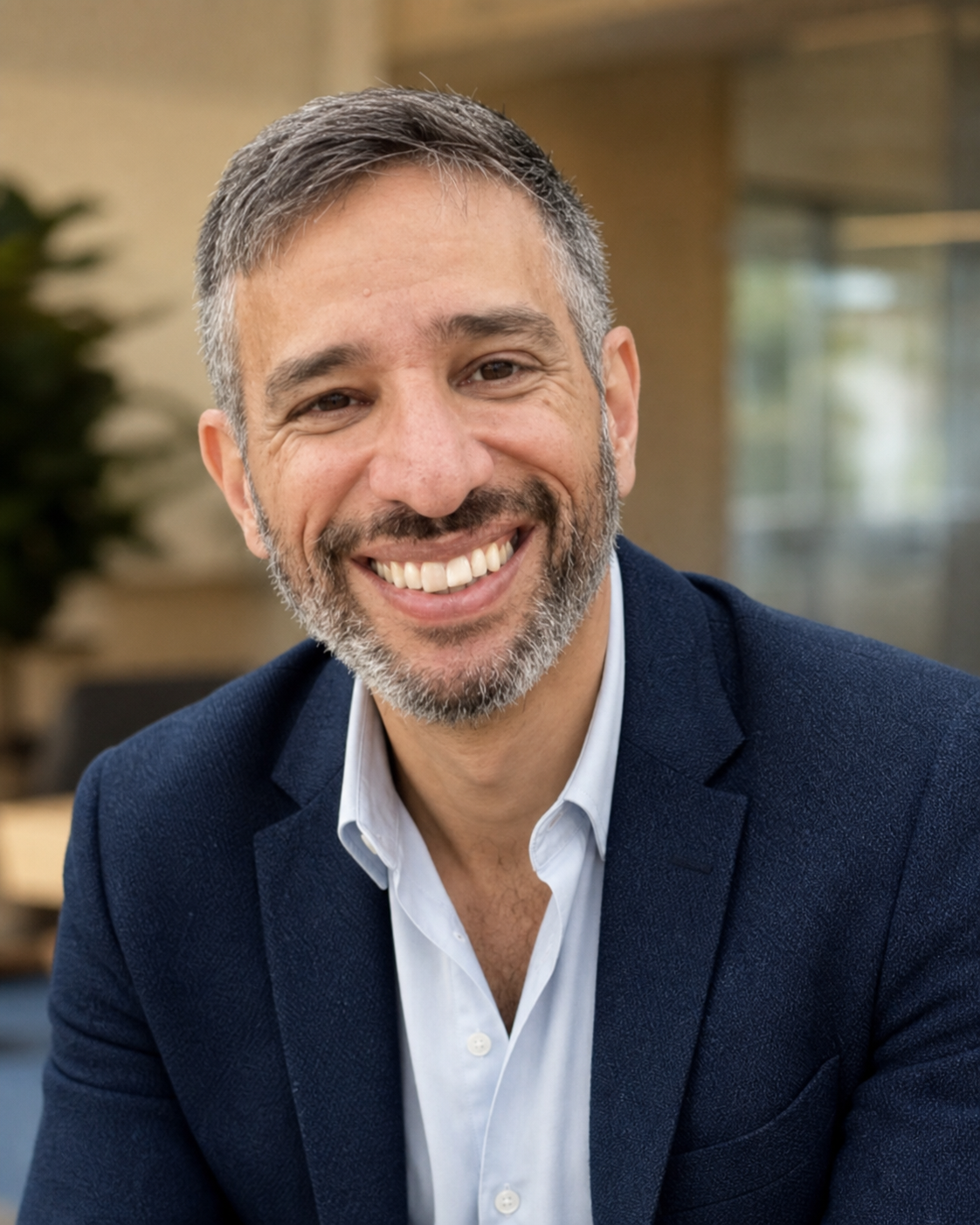 Jason Rosenberg smiling in a professional setting